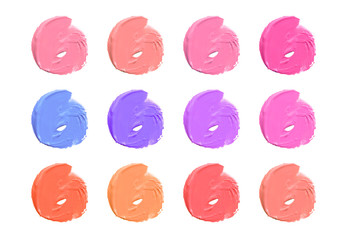texture of the lipstick of different colors isolated on white background. Set of multicolored strokes. Cosmetic product.
