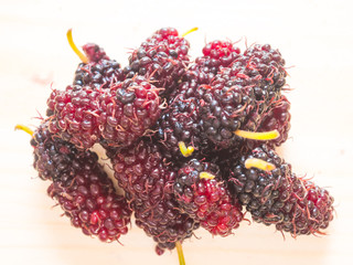 Group of  mulberry on wooden