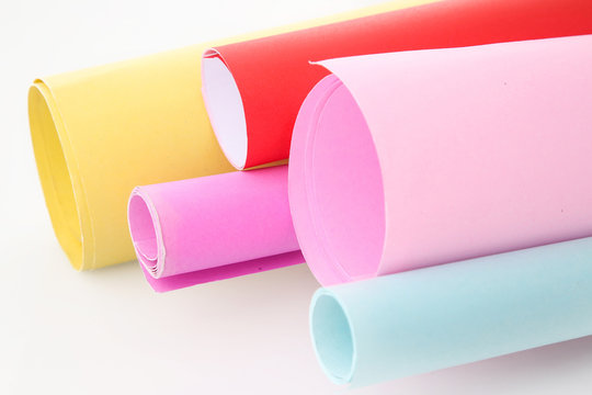 Studio shoot of rolls of colored paper
