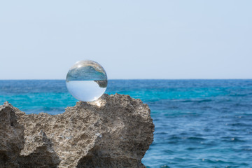Glass ball at Mediterranean Sea