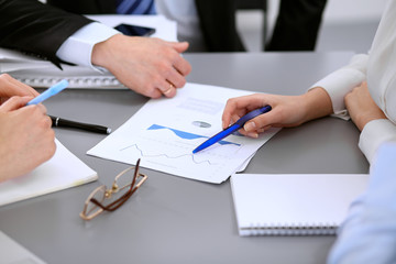 Close up of business people at meeting