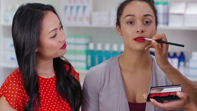  TV presenters on shopping channel selling beauty products & talking to camera