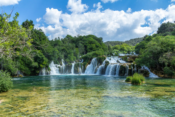 Krka national park, Croatia - May 05, 2016: waterfall and rock pool