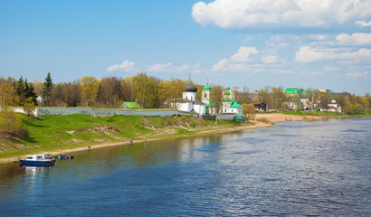 Fototapeta na wymiar View of the ancient Mirozhsky monastery on the banks of the Velikaya River in Pskov