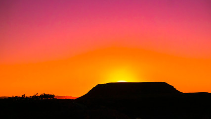 Sun Falling Behind the Mountain