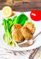 lentil cutlets with paprika and porridge, greens, tomato, vegan