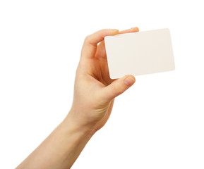 Obraz premium Blank business card in a female hand isolated on white backgroun