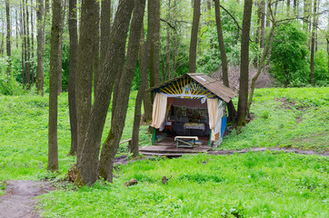 Holy spring in forest near village Sherstin, Belarus