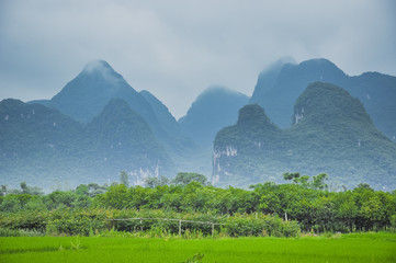 Beautiful karst mountains scenery in the mist
