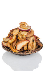 Dried apple slices on the plate  isolated