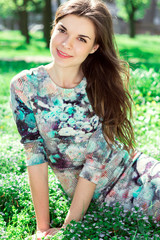 Naklejka premium Beautiful girl in spring park