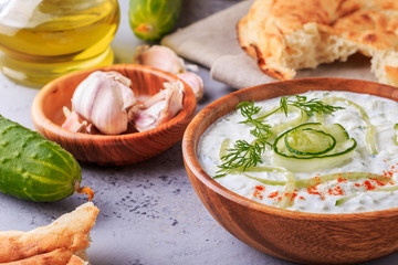 Greek salad tzatziki of cucumber, yogurt , olive oil, garlic.