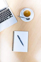 Office desk table with laptop computer