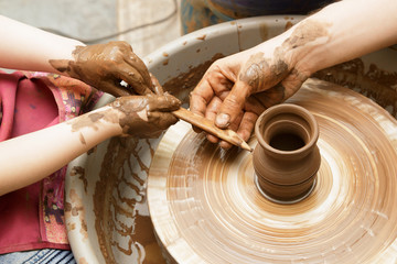 We do a pot on a potter's wheel