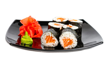 traditional fresh japanese sushi rolls on a white