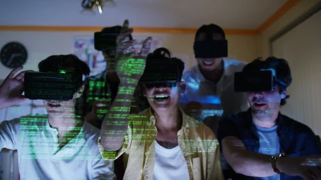  Group of young male computer gamers immersed in a virtual reality game