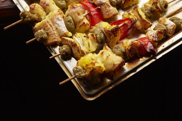appetizer skewers the fish with vegetables, olives