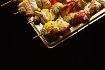 appetizer skewers the fish with vegetables, olives