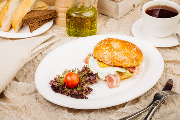 Burger in a white plate on table