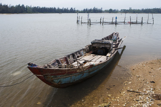 fishing boat in vietnam, front view on lake