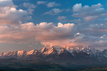 Cloudy Tatra mountains in the beautiful morning, covered with snow