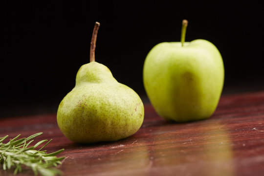pear and apple on the table