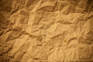 Brown crumpled eco paper background.