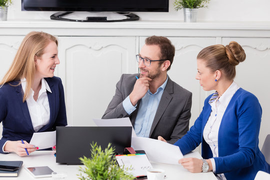 Small Team On A Business Meeting   