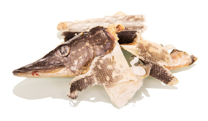 Garbage. Head and cleaning dried pike isolated on white