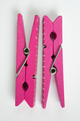 Two Pink Clothes Pins with Fun Patterns Flipped Top View