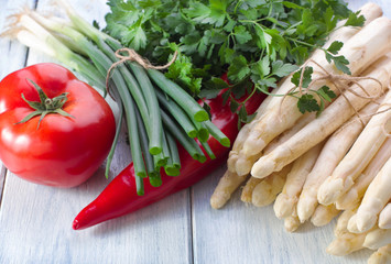 Vegetable spring asparagus tomato chives and parsley