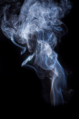 Fototapeta premium White smoke on a black background.