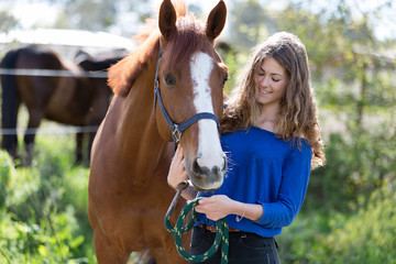 Fototapeta premium pretty girl with her horse