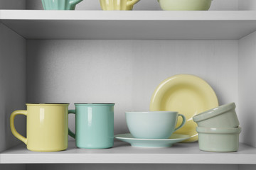 Dishes in cupboard in the kitchen