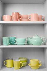 Dishes in cupboard in the kitchen