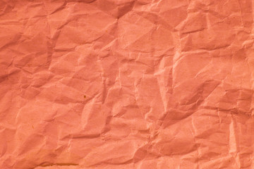 Fototapeta premium Red crumpled paper texture for background.