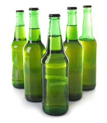Bottles with fresh beer isolated on white