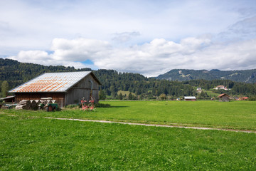 Fototapeta na wymiar View On Farmer's Barn at Oberstdorf / Bavaria