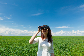 young woman with binocular