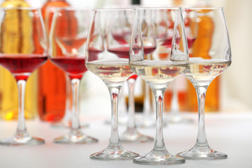 Wine glasses with red and white wine, closeup
