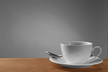 Obraz na płótnie Canvas Cup of tea on wooden table