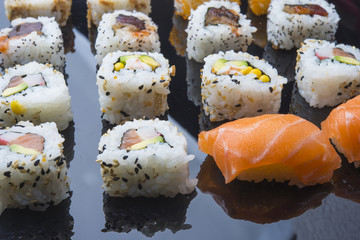 Sushi set isolated on black background
