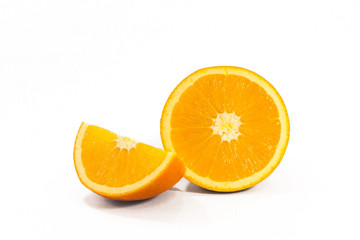 Sliced orange fruit with leaves isolated on white background