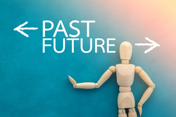 past and future dicision with wooden figure.jpg
