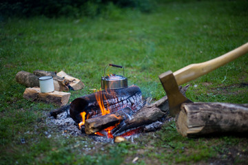 Camping in the woods on the banks of the river.