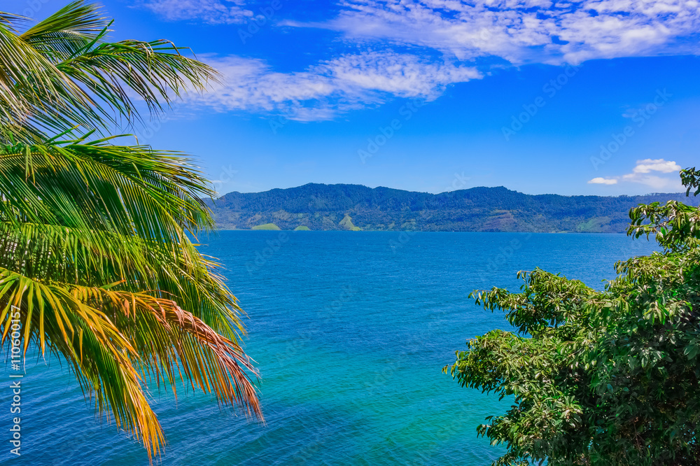 Wall mural beautiful tropical landscape, lake toba, sumatra, indonesia, southeast asia. world's largest volcani