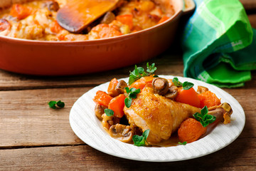 Chicken stewed with pumpkin and mushrooms.