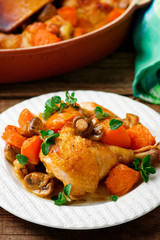 Chicken stewed with pumpkin and mushrooms.