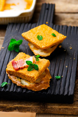 Pumpkin paste with bacon on rye bread