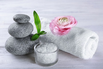 Composition of spa treatment on white wooden background